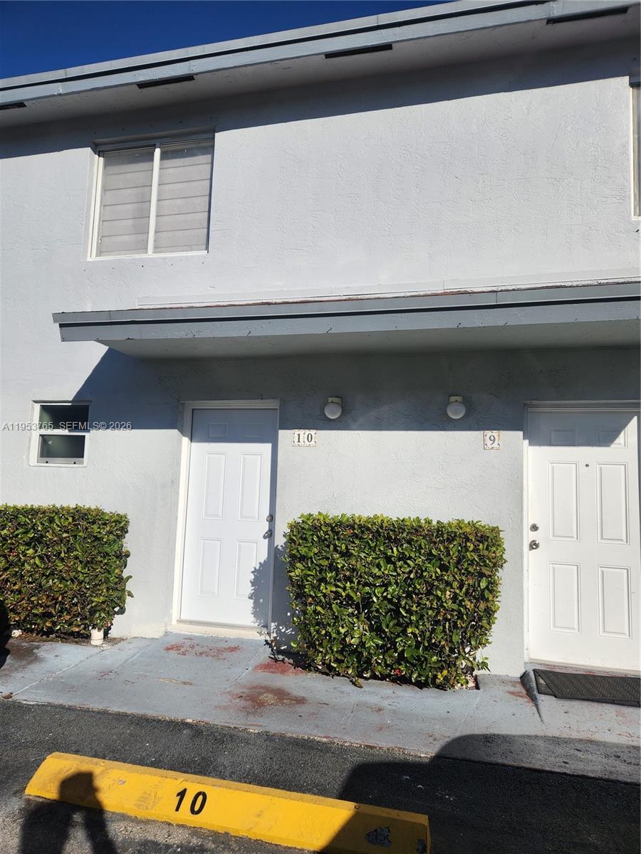 8025 Northwest 8th Street, Unit 10 Miami, FL 33126 - Photo 2 of 26 a view of front door of house