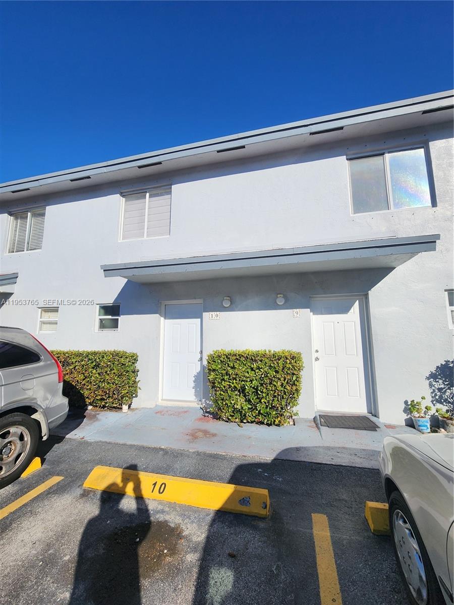 8025 Northwest 8th Street, Unit 10 Miami, FL 33126 - Photo 3 of 26 a view of swimming pool in the backyard of house along with outdoor seating