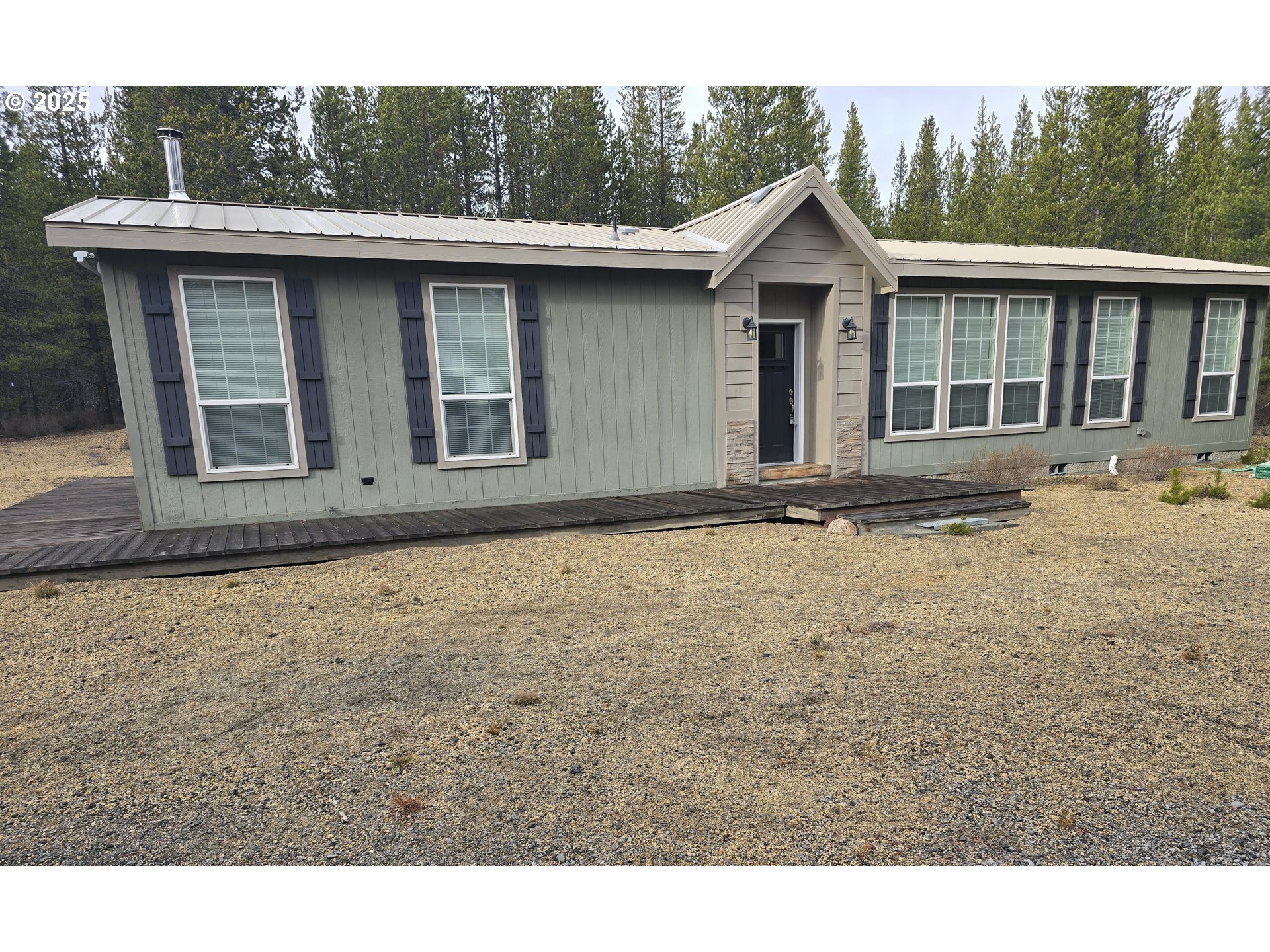 125220 Cappy Court Crescent Lake, OR 97733 - Photo 2 of 34 a front view of a house with yard