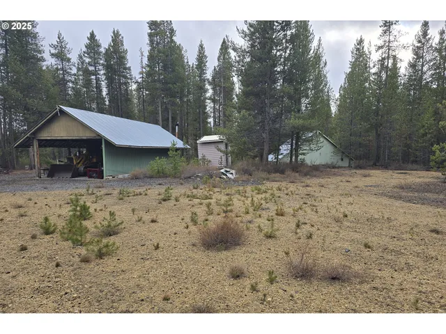a view of a backyard with a garden
