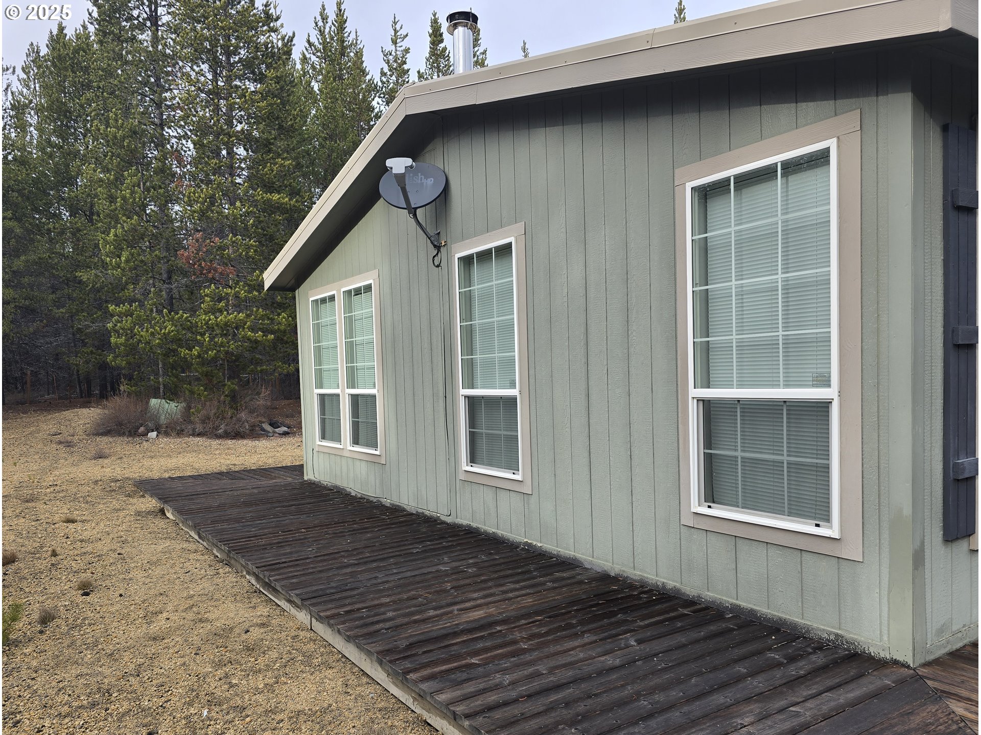 125220 Cappy Court Crescent Lake, OR 97733 - Photo 4 of 34 a house with trees in the background