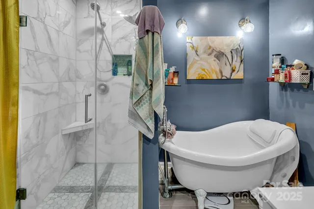 a bathroom with a toilet sink and shower