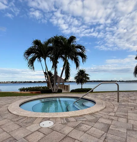 a view of swimming pool with a yard