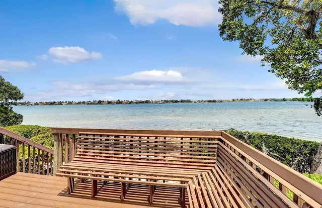 a view of a lake from a balcony