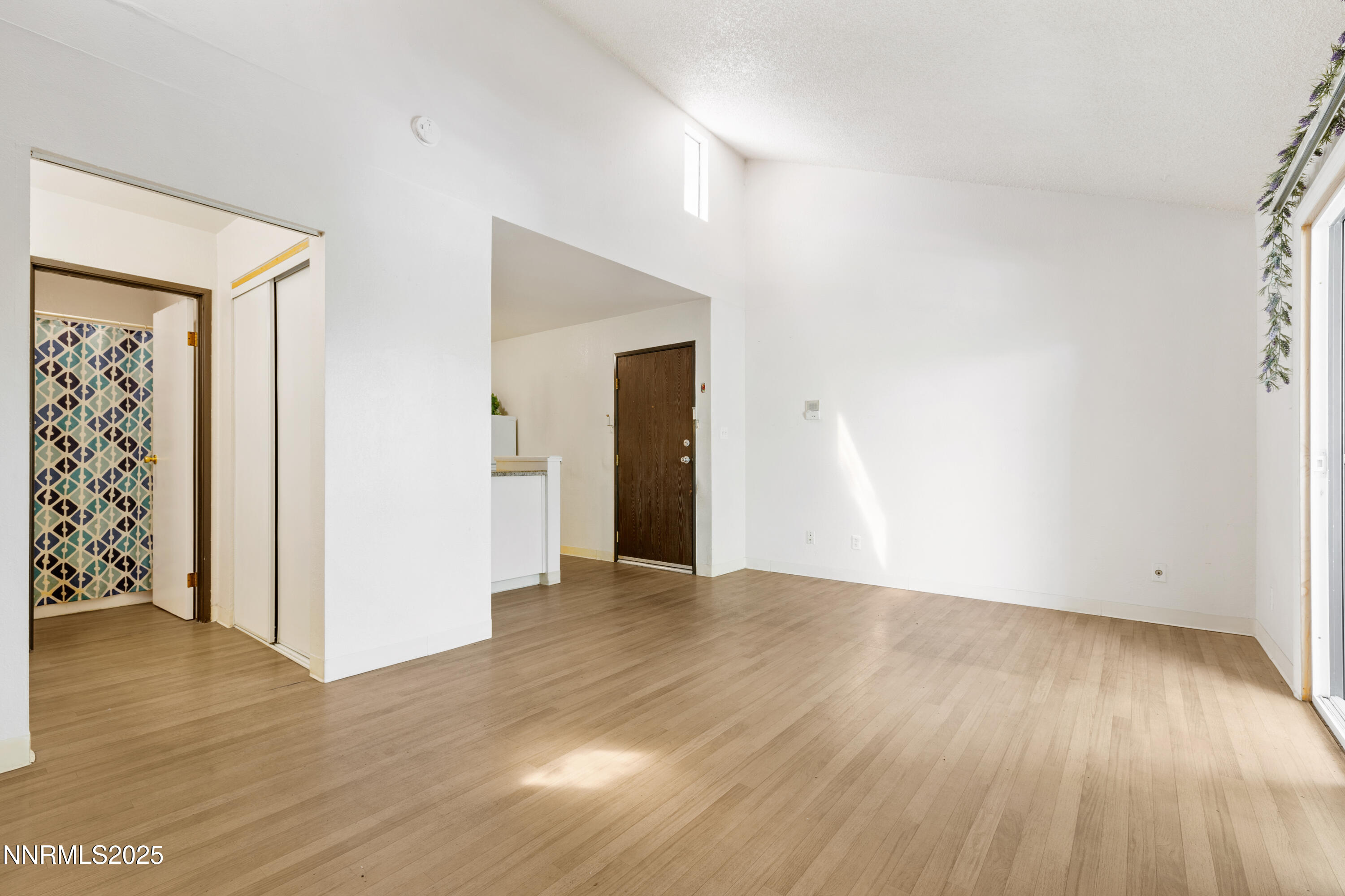 2450 Lymbery Street, Unit 307 Reno, NV 89509 - Photo 14 of 16 a view of a room with wooden floor