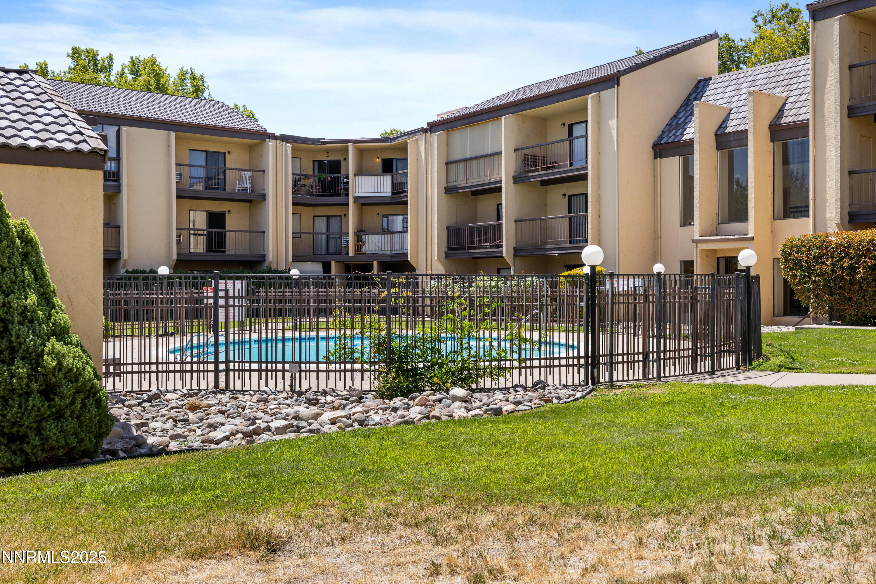 2450 Lymbery Street, Unit 307 Reno, NV 89509 - Photo 5 of 16 a front view of house with a garden
