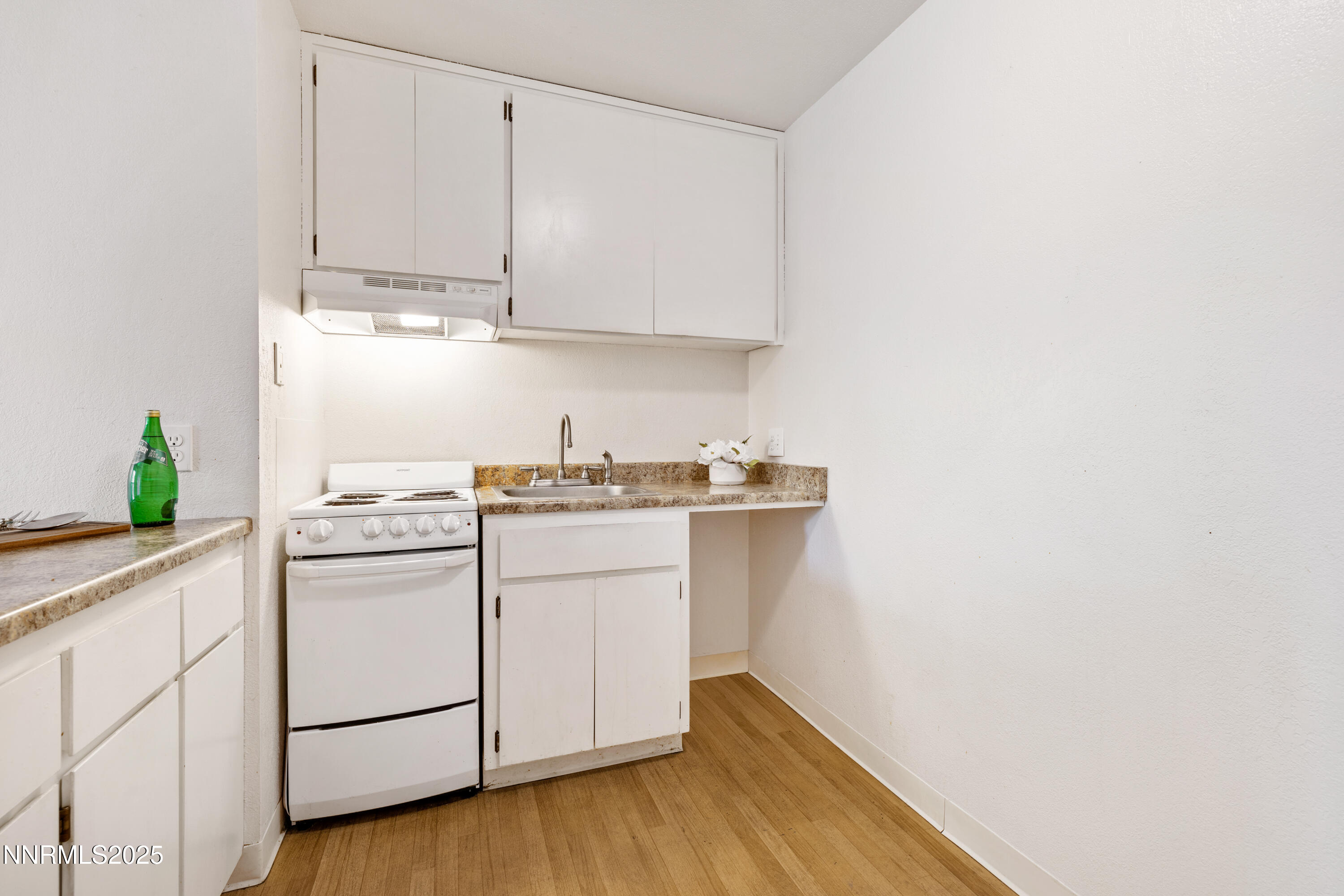 2450 Lymbery Street, Unit 307 Reno, NV 89509 - Photo 9 of 16 a utility room with cabinets washer and dryer