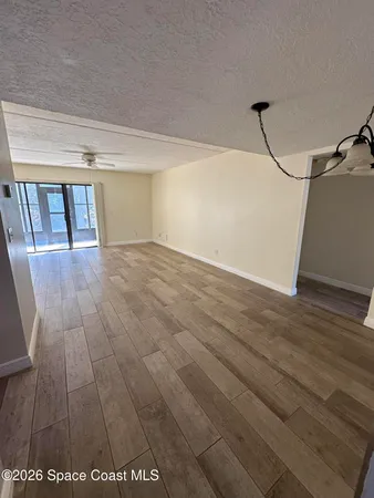 a view of a room with an empty space