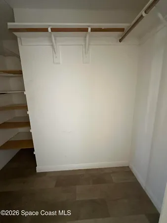 a view of small space with racks on the wall