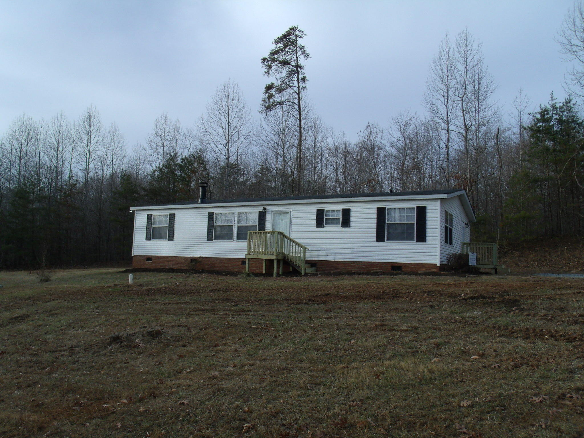 384 Kelly Mill Road Stuart, VA 24171 - Photo 1 of 15 a house view with a sitting space