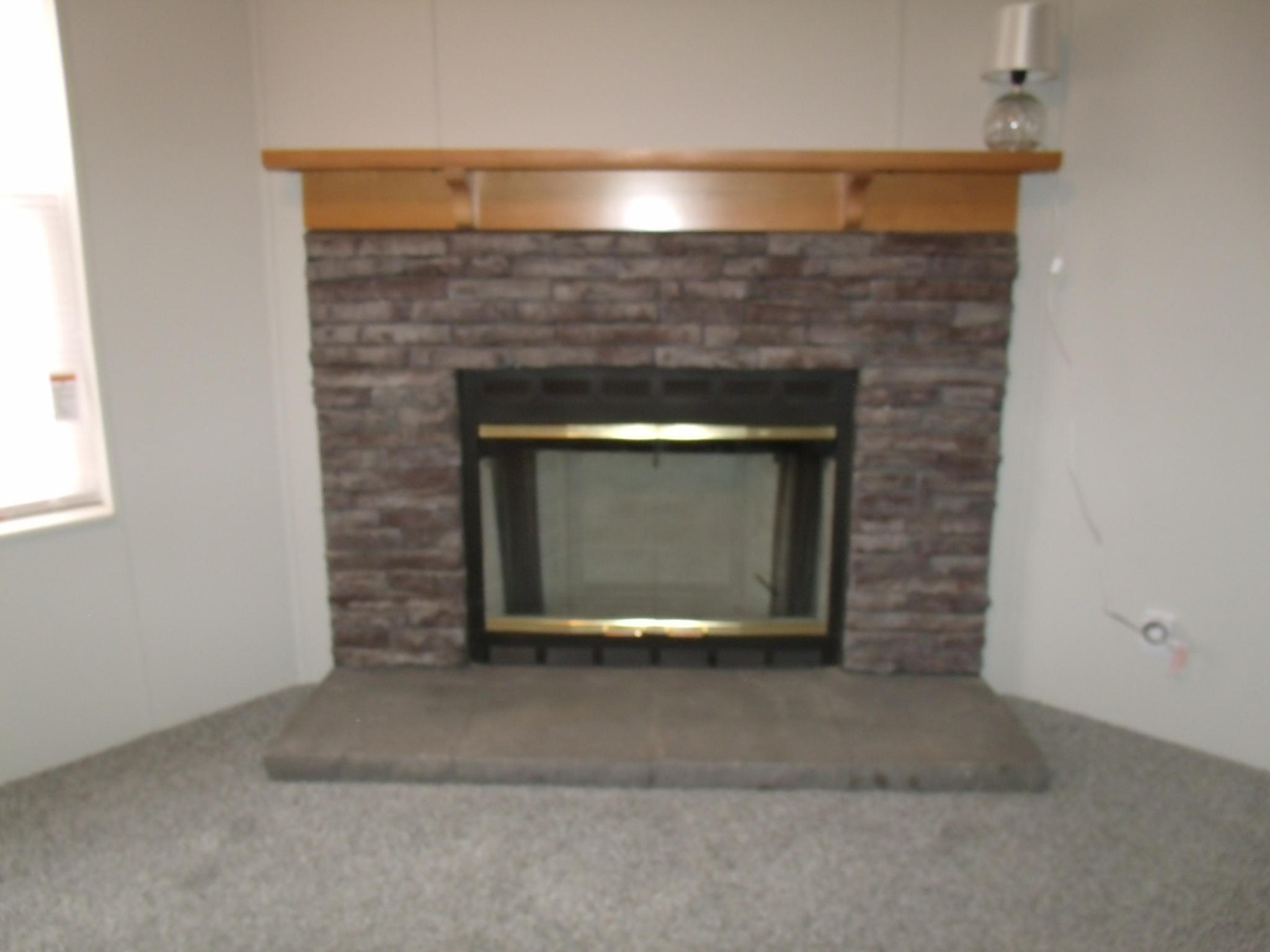 384 Kelly Mill Road Stuart, VA 24171 - Photo 15 of 15 a living room with a fireplace