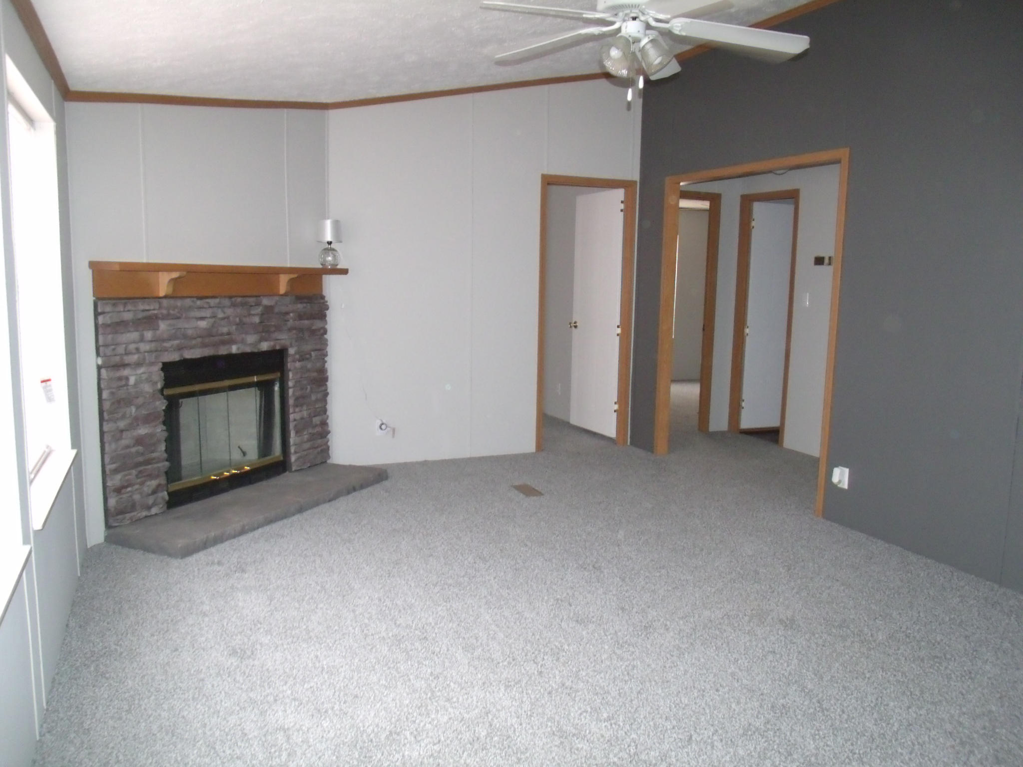 384 Kelly Mill Road Stuart, VA 24171 - Photo 4 of 15 a view of empty room with fireplace