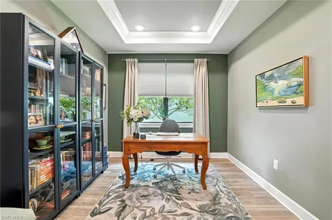 a view of workspace with wooden floor