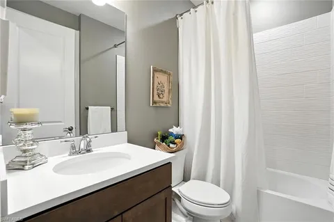 a view of swimming pool with outdoor seating