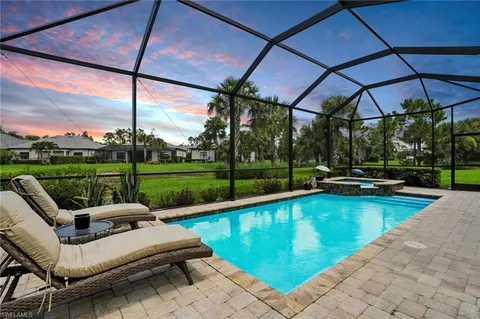 a view of a swimming pool with a porch