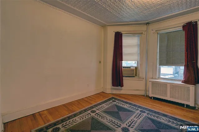 a view of an empty room and window