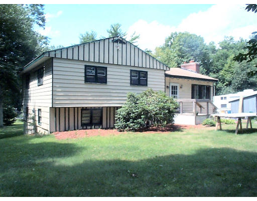 291 Bailey Hill Road Killingly, CT 06239 - Photo 1 of 1 a front view of house with yard and green space