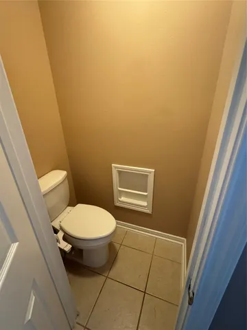 a bathroom with a toilet and a sink