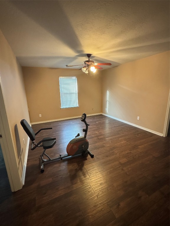 3219 Witney Way Fresno, TX 77545 - Photo 14 of 23 a room with gym equipment
