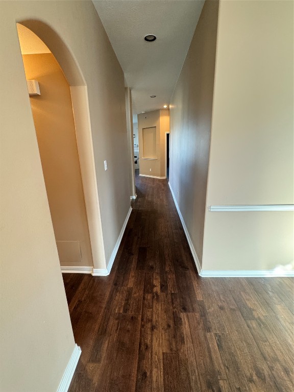 3219 Witney Way Fresno, TX 77545 - Photo 2 of 23 a view of a hallway with wooden floor and staircase
