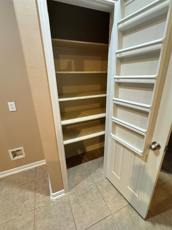 3219 Witney Way Fresno, TX 77545 - Photo 7 of 23 a view of walk in closet with empty racks