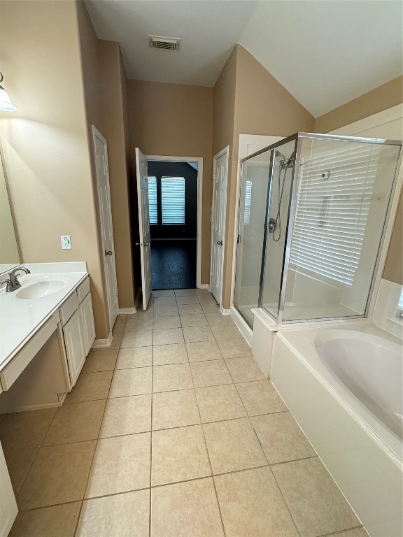 3219 Witney Way Fresno, TX 77545 - Photo 10 of 23 a bathroom with a sink a mirror and a bathtub