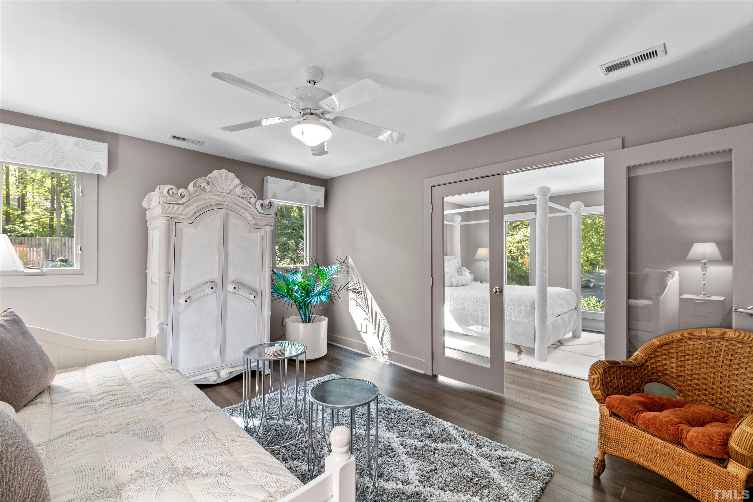 10101 East Roadstead Way Raleigh, NC 27613 - Photo 34 of 68 a living room with furniture and wooden floor