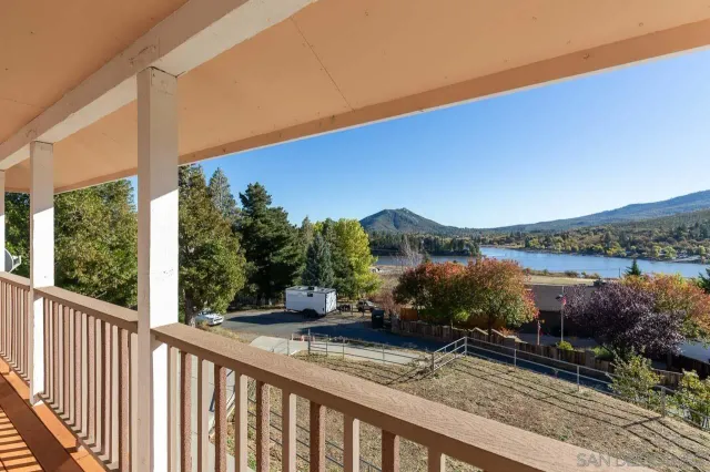a view of a lake from a balcony