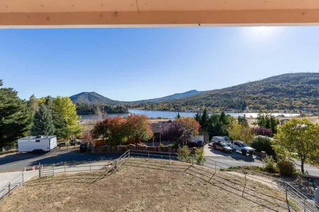 a view of a street with a sitting area