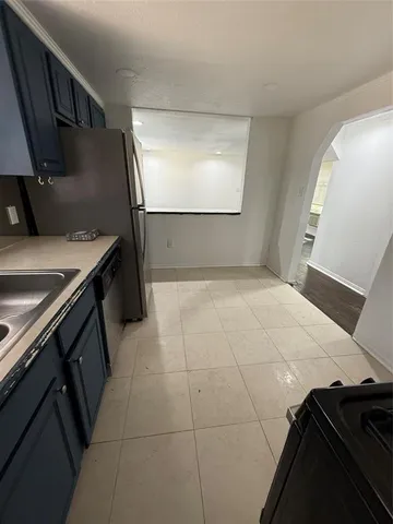 a view of a kitchen from the kitchen