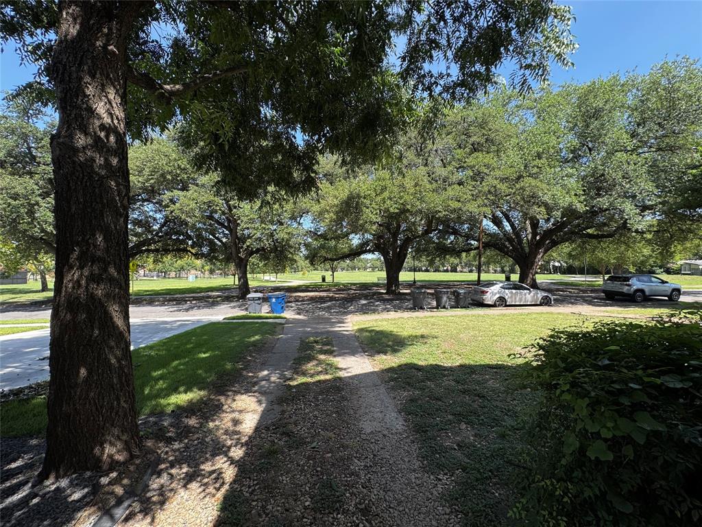 4610 Victor Street, Unit 5 Dallas, TX 75246 - Photo 10 of 13 a view of outdoor space with garden