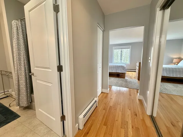 a view of a bedroom from a hallway