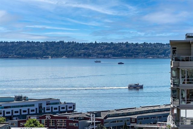a front view of a building with a garden