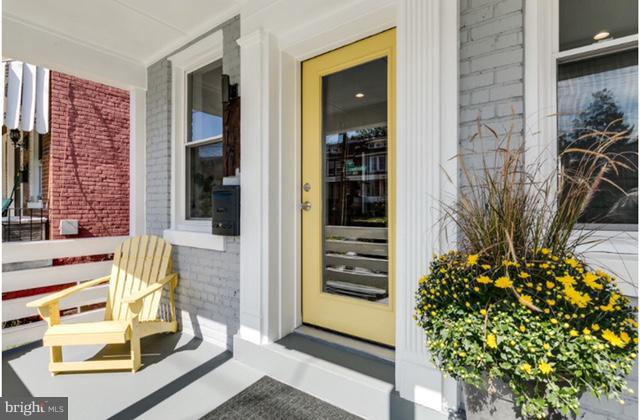 717 Rittenhouse Street Northwest Washington, DC 20011 - Photo 5 of 27 view of the front door of house with outdoor seating