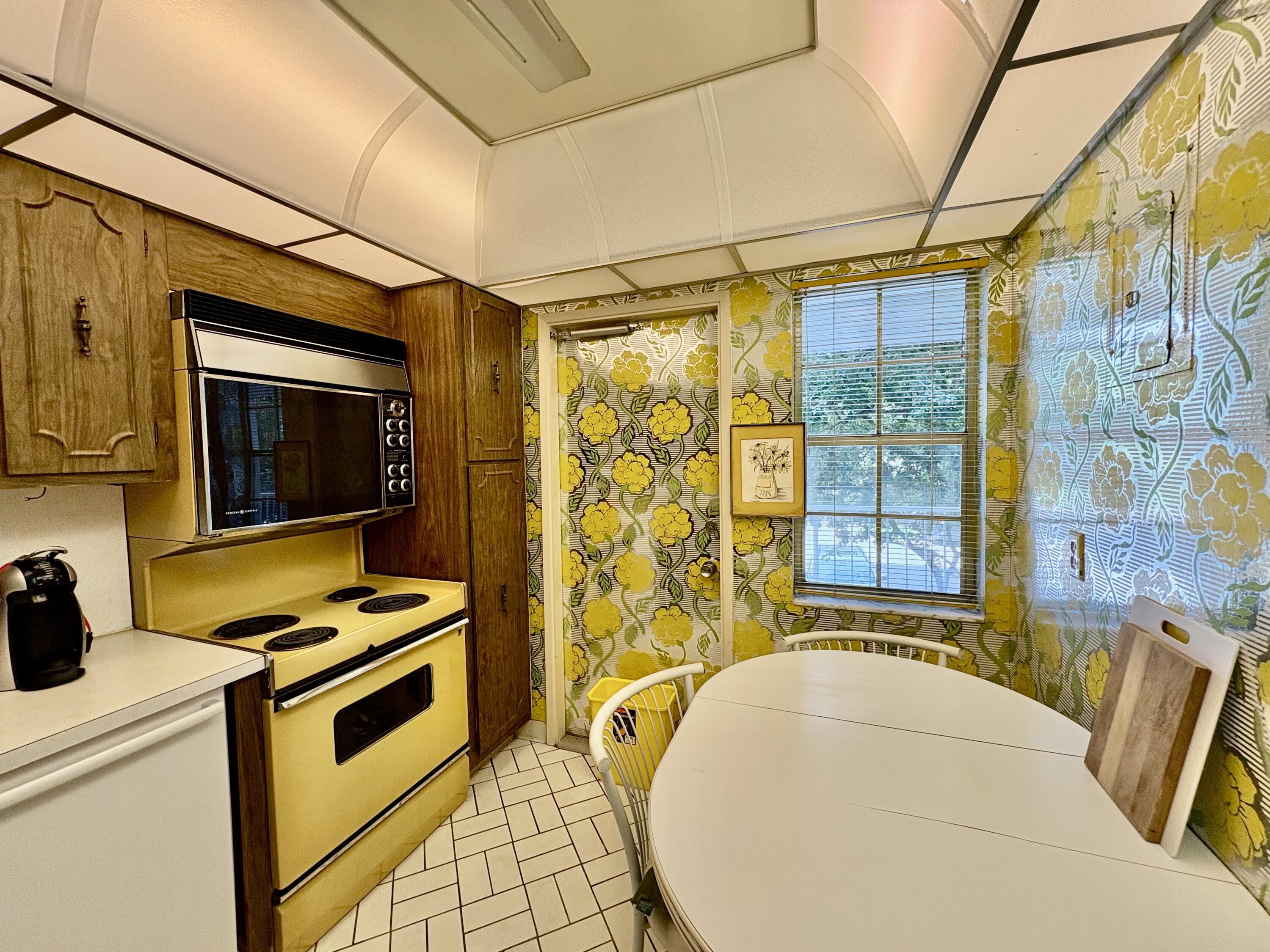 3150 North Course Lane, Unit 202 Pompano Beach, FL 33069 - Photo 11 of 18 a bathroom with a tub sink and mirror