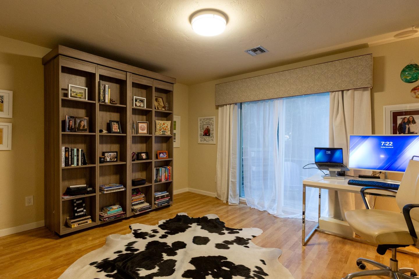 779 Alice Street Monterey, CA 93940 - Photo 16 of 27 a bedroom with a bed and a book shelf