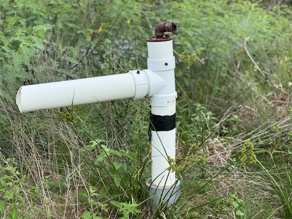a view of a toilet in a bathroom