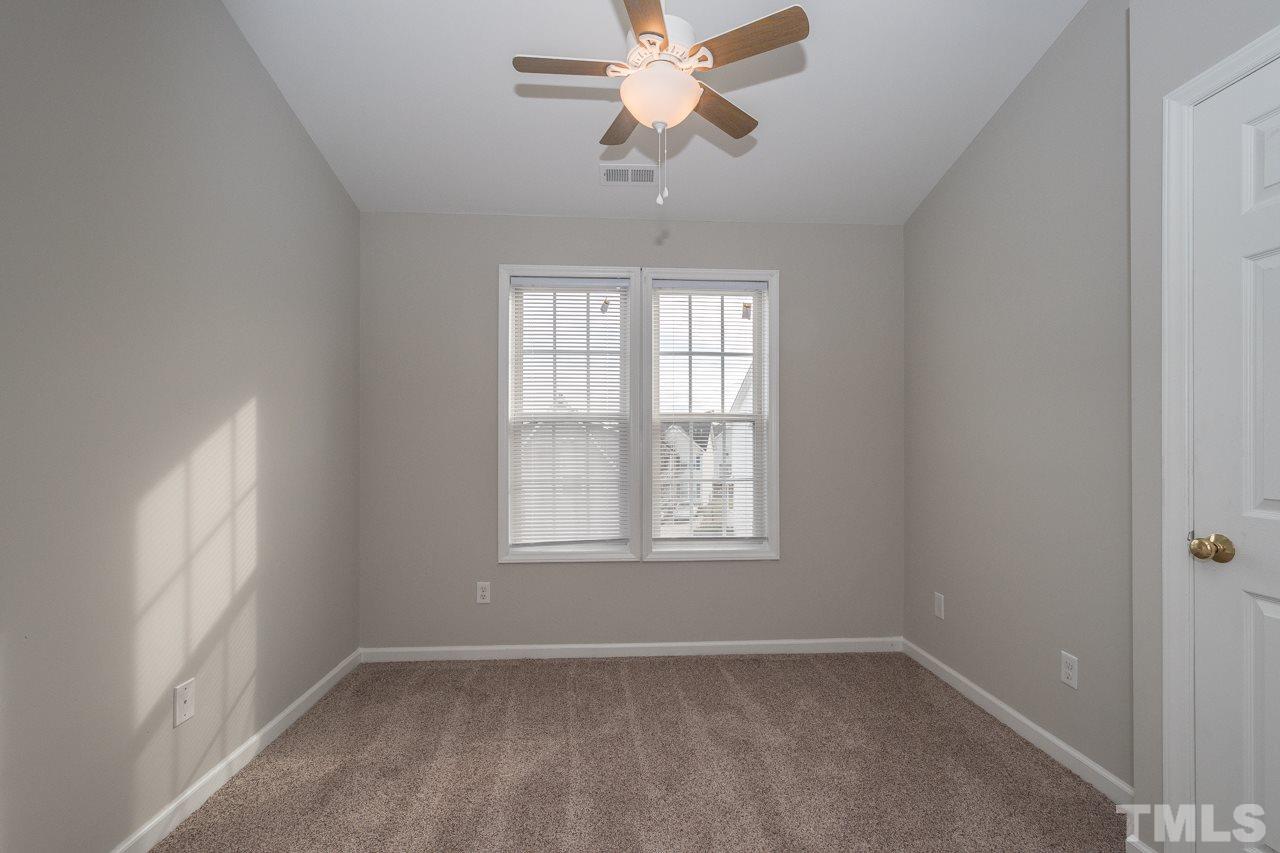 4424 Windstorm Way Raleigh, NC 27616 - Photo 14 of 14 a view of an empty room with a window