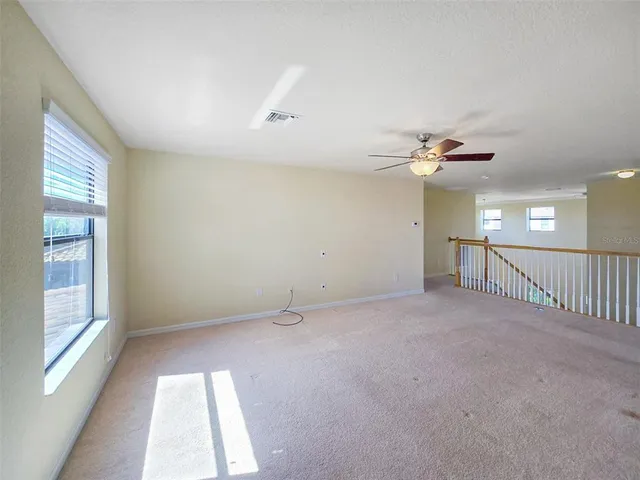 a view of a room with a window