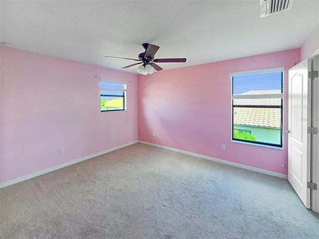 a bathroom with a double vanity sink mirror and double