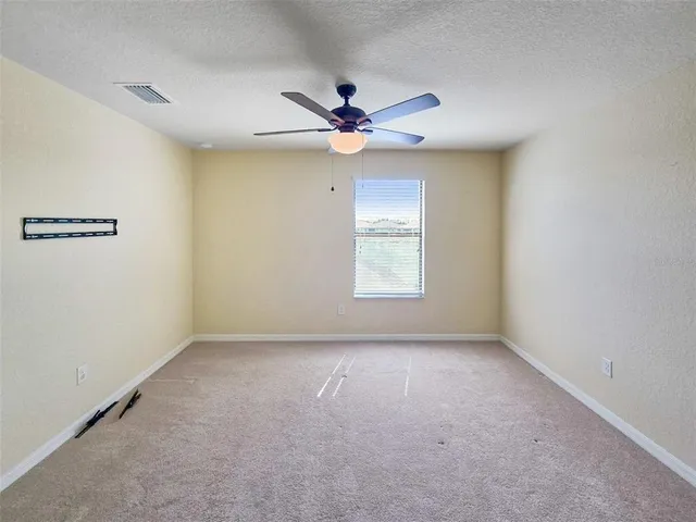 a bathroom with a toilet a sink and bathtub