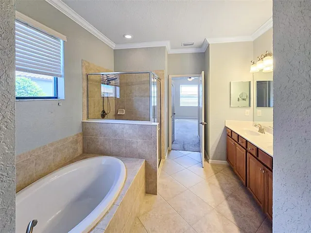 a view of a hallway with windows