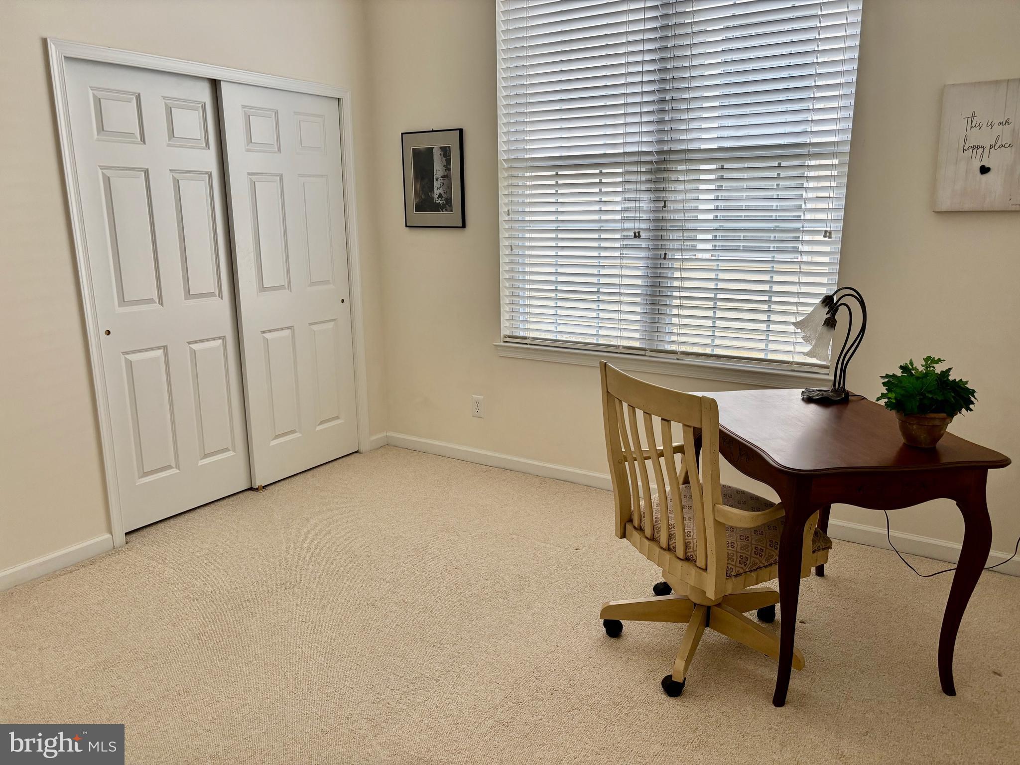 165 Einstein Way Cranbury, NJ 08512 - Photo 19 of 37 a view of a workspace with furniture and a window