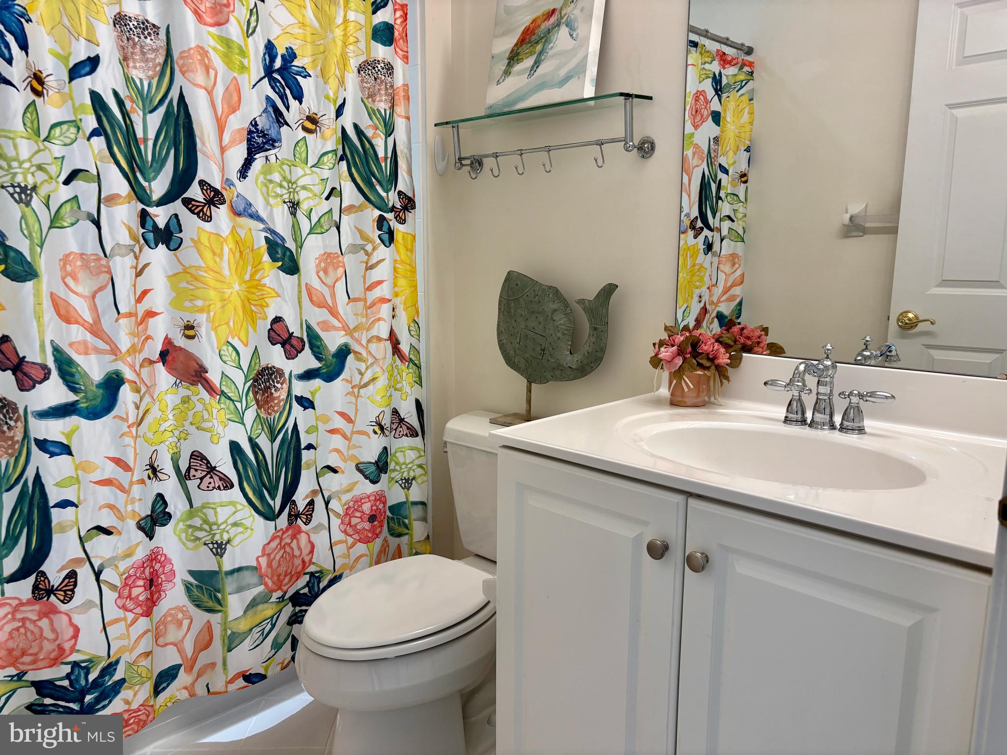 165 Einstein Way Cranbury, NJ 08512 - Photo 28 of 37 a bathroom with a sink toilet and shower curtain
