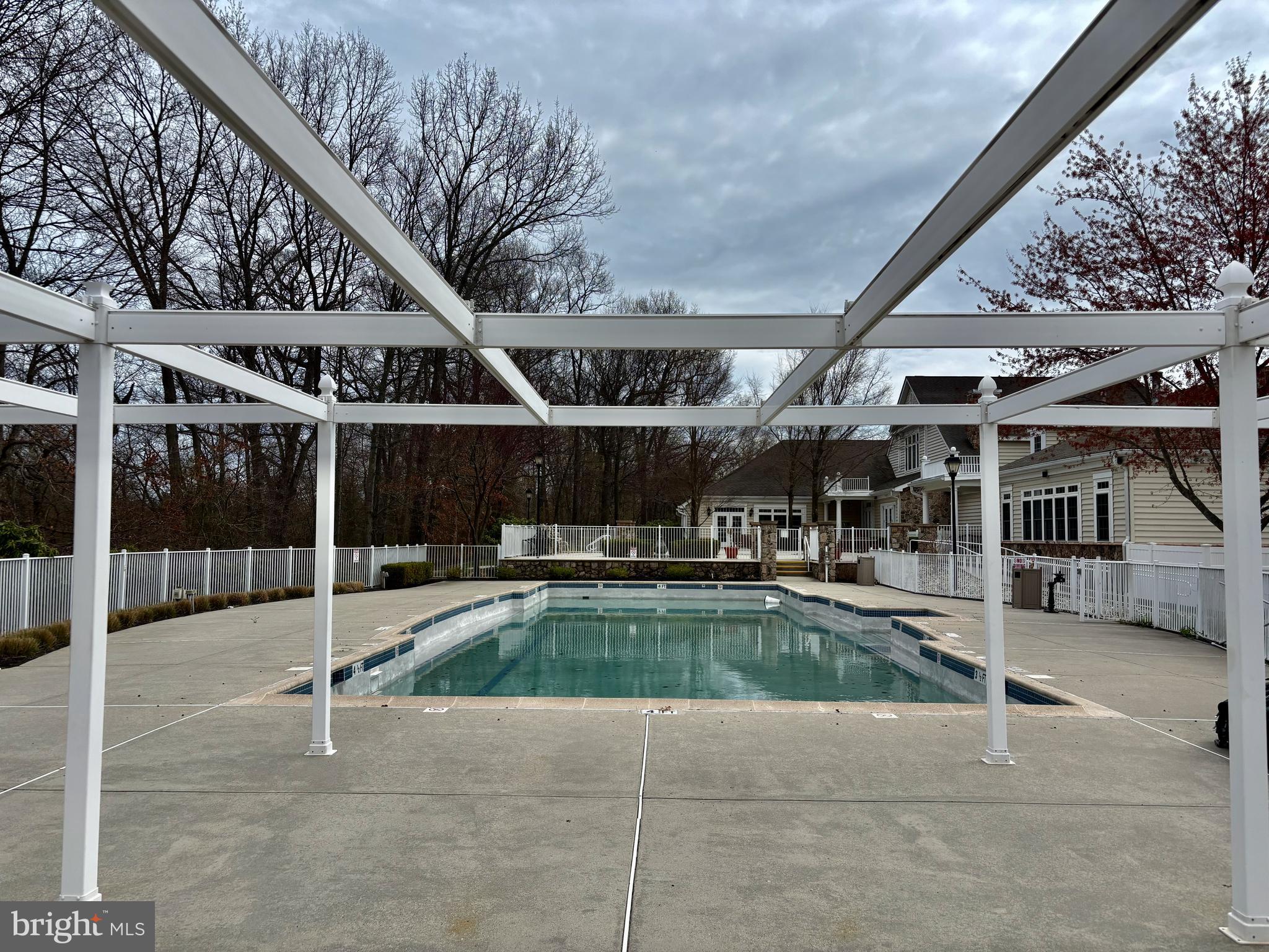 165 Einstein Way Cranbury, NJ 08512 - Photo 36 of 37 a view of a patio with a table and chairs