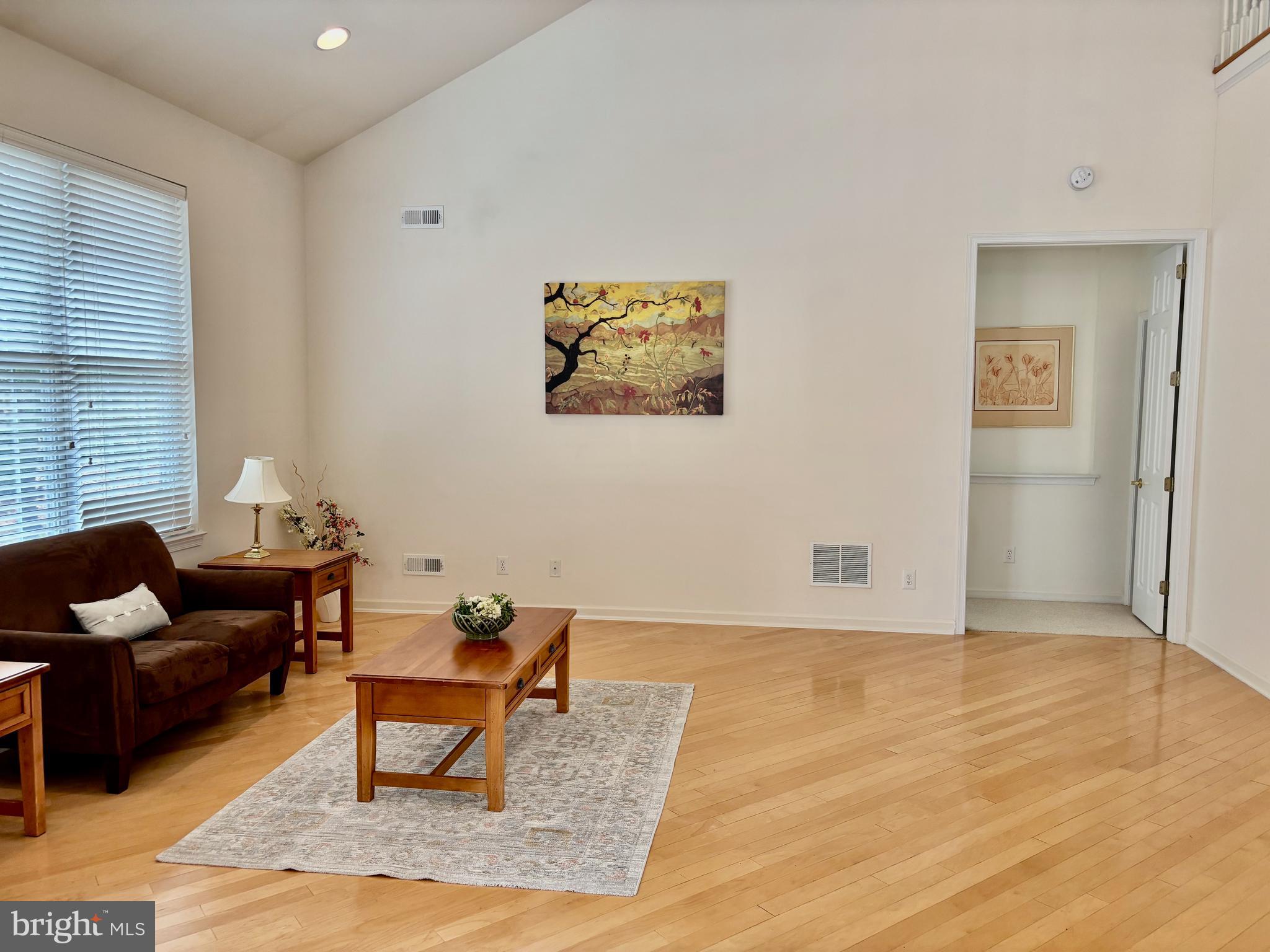 165 Einstein Way Cranbury, NJ 08512 - Photo 4 of 37 a living room with furniture and wooden floor