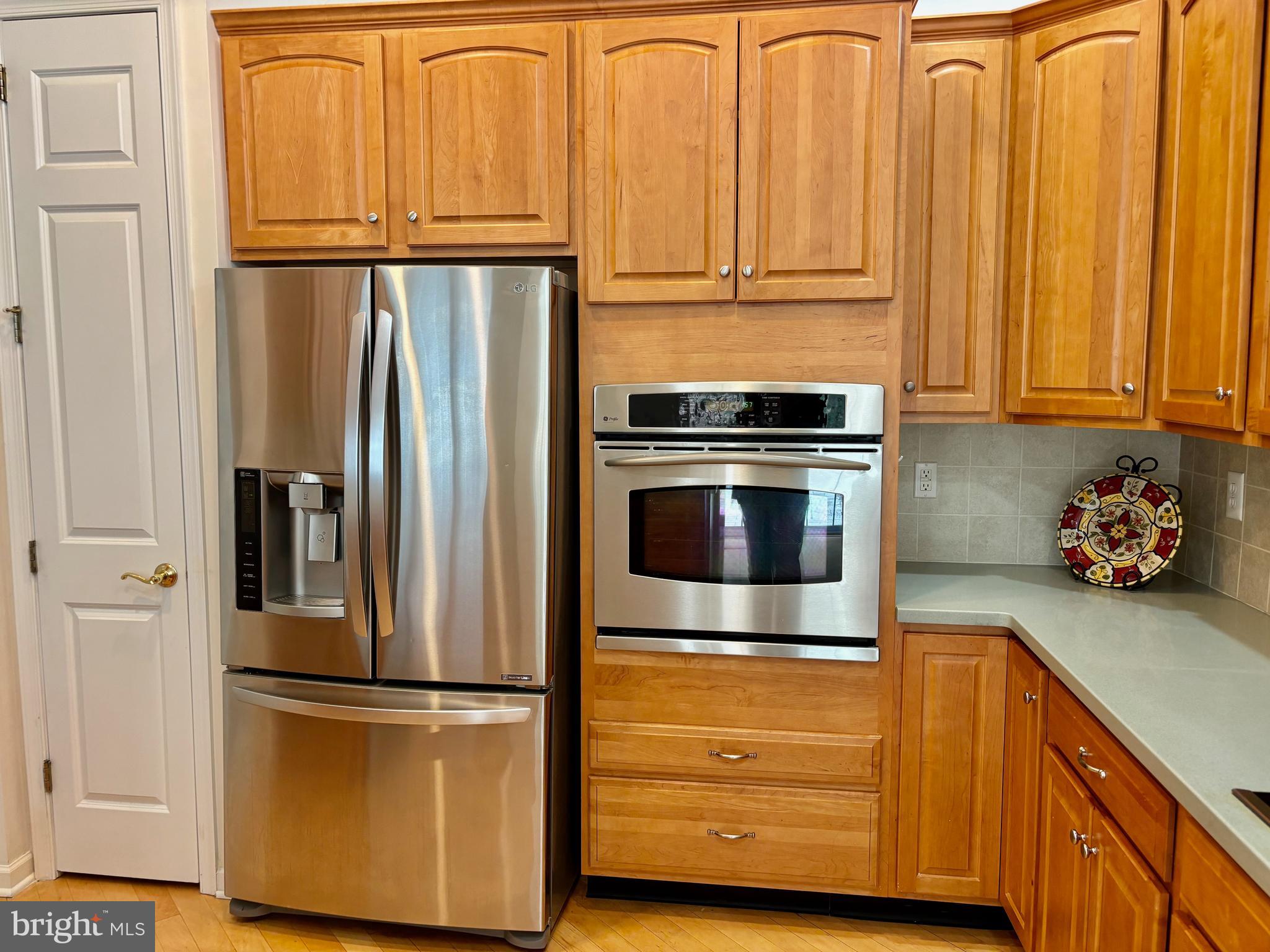 165 Einstein Way Cranbury, NJ 08512 - Photo 7 of 37 a kitchen with stainless steel appliances granite countertop a refrigerator and a sink