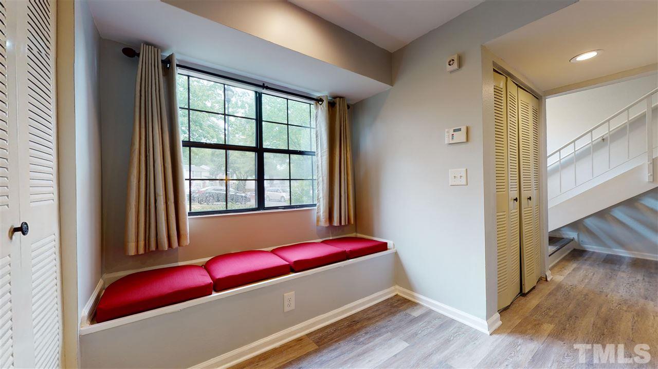 2453 Condor Court, Unit 2453 Raleigh, NC 27615 - Photo 11 of 26 a room with a bed and a window