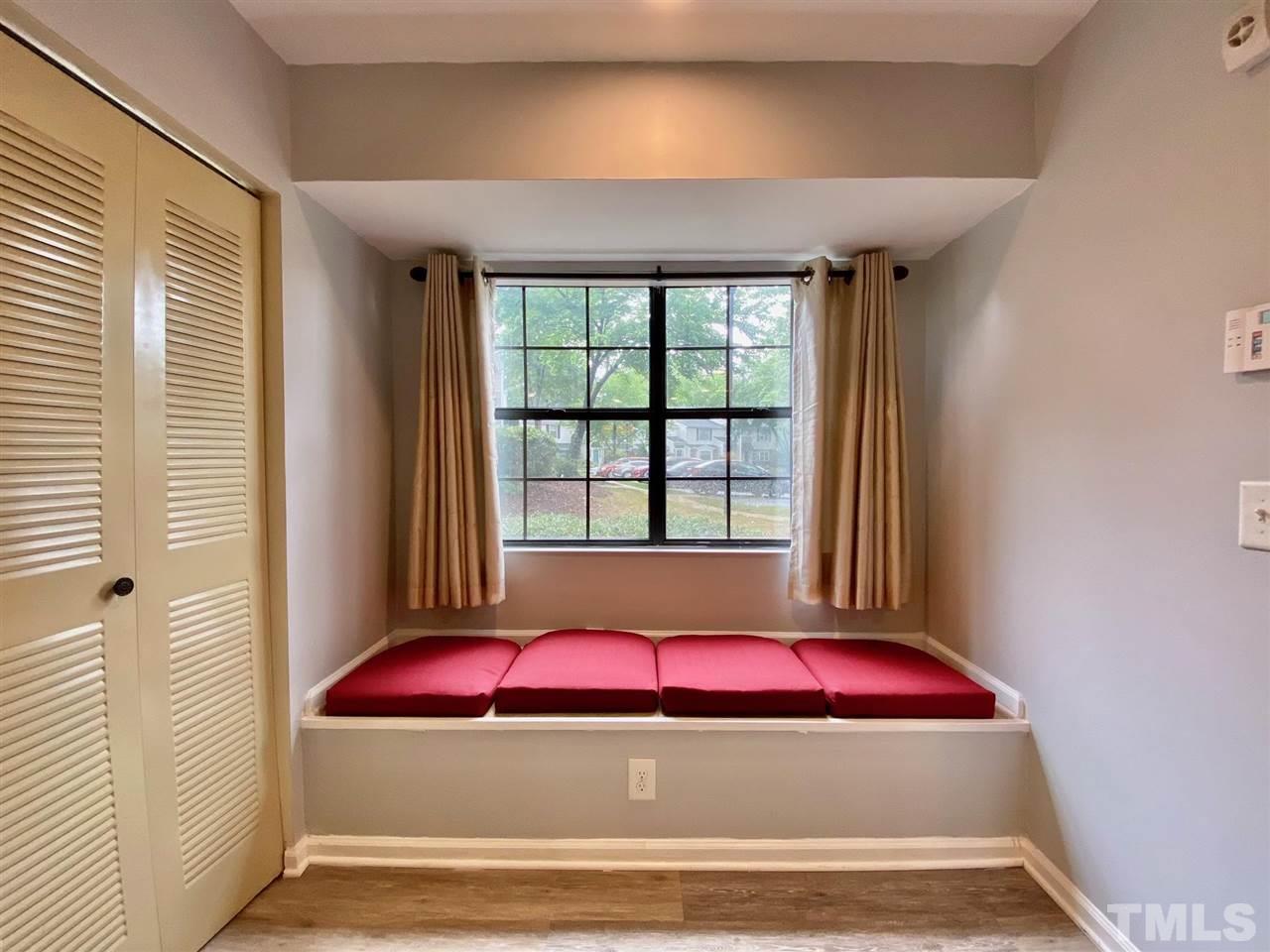 2453 Condor Court, Unit 2453 Raleigh, NC 27615 - Photo 12 of 26 a view of a bedroom with window