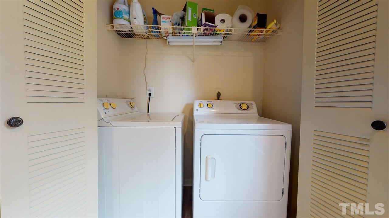 2453 Condor Court, Unit 2453 Raleigh, NC 27615 - Photo 14 of 26 a utility room with dryer and washer